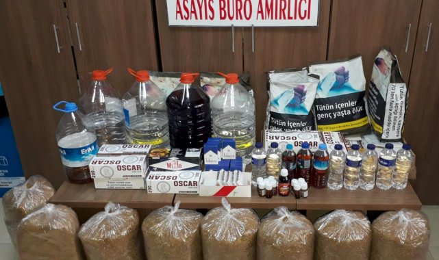 Karacabey'de sahte içki ve kaçak sigara operasyonu: 2 gözaltı