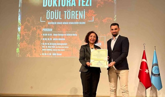 ADÜ'nün araştırma görevlisi üçüncülük ödülünün sahibi oldu