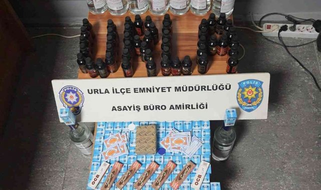 Urla'da kaçak içki ve sigara satışı yapan markete polis baskını