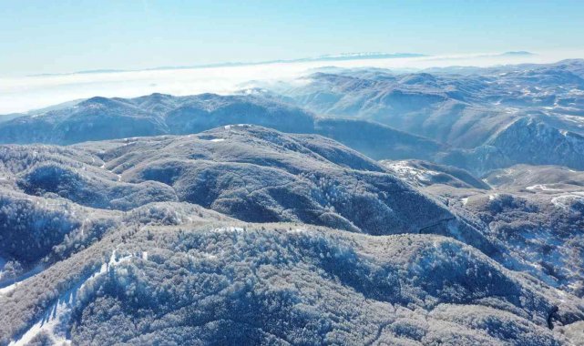 İki kayak merkezinin zirvesi tek karede buluştu