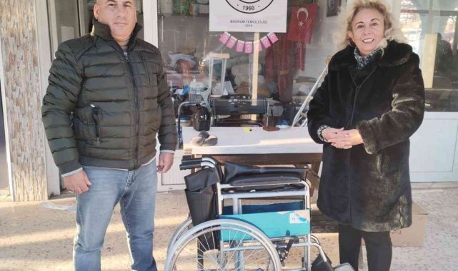 Mavi kapaklar tekerlekli sandalyeye dönüştü