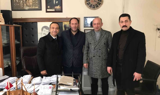 MHP'li Özyürek'in "Kara Kışa Karşı Küçük Yürekleri Isıttık" kampanyasında çocuklar sevindi