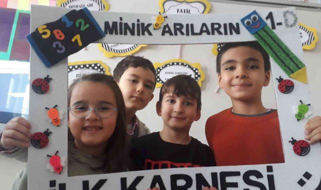 Minik 1'lerin ilk karne sevinci