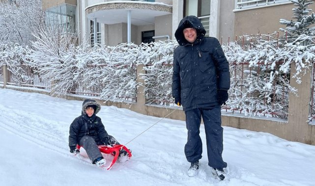 Oğlunu market ve berbere kızakla çekerek götürdü
