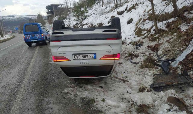 Takla atan otomobilden yara almadan çıktı