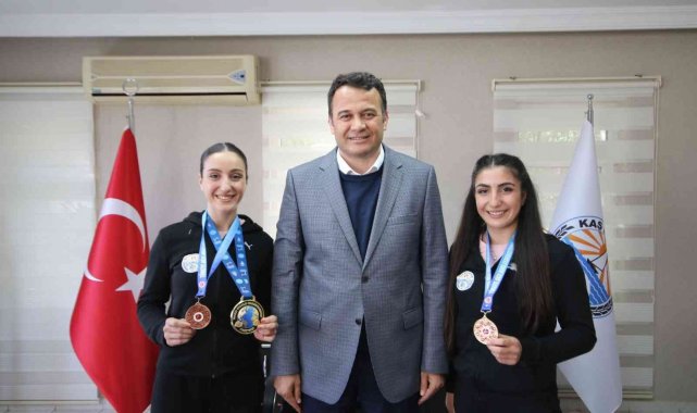 Doğan kardeşlerden Kaş'a gurur madalyası