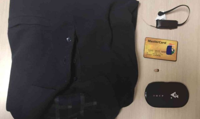 Ehliyet sınavına kameralı kopya düzeneği ile girmeye çalışırken yakalandı