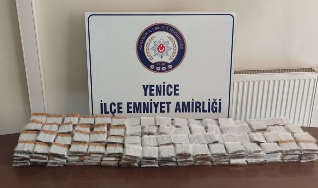 Terk edilmiş araçta bandrolsüz sigara ele geçirildi