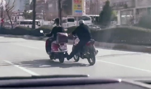 Akan trafikte tehlikeli yardımlaşma