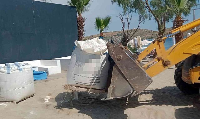 Bodrum Belediyesi ekipleri 'beyaz kum' serimine engel oldu
