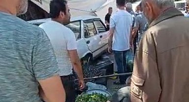 Otomobil pazara daldı, faciadan dönüldü