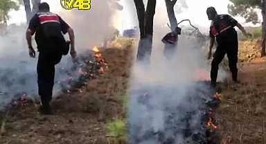 BOTLARIYLA ORMAN YANGININI SÖNDÜRMEYE ÇALIŞTILAR!