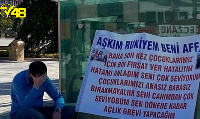 Kırşehir&#039;de bir adam, kendisini terk eden eşinden pankart açıp özür diledi