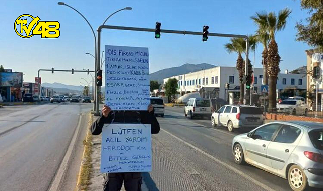 Yardım çağrısı için pankart açtı