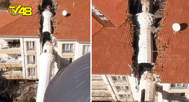 Depremde yıkılan minare, apartmanı ikiye böldü