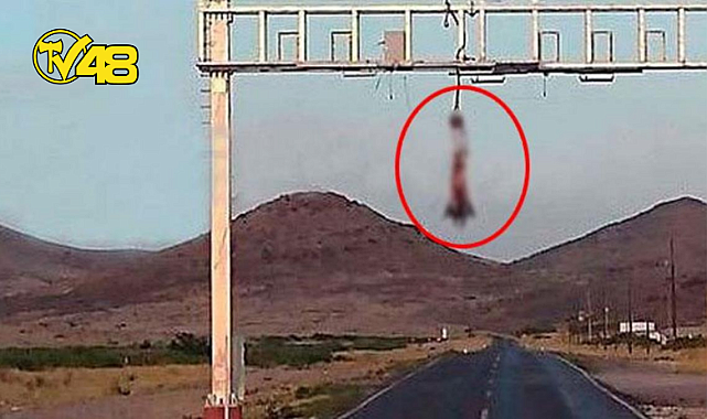 AKIL ALMAZ İNFAZ! CİNSEL ORGANI AĞZINA KONUP AYAKLARINDAN DİREĞE ASILAN ERKEK BULUNDU