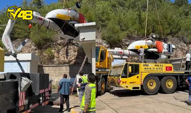 MENDERES İLÇESİ TAHTALI BARAJI&#039;NA DÜŞEN HELİKOPTERİN ENKAZI ÇIKARTILDI