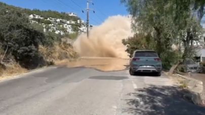 BODRUM’DA ANA SU HATTI PATLADI, YOL ÇÖKTÜ VE EVLERİ SU BASTI