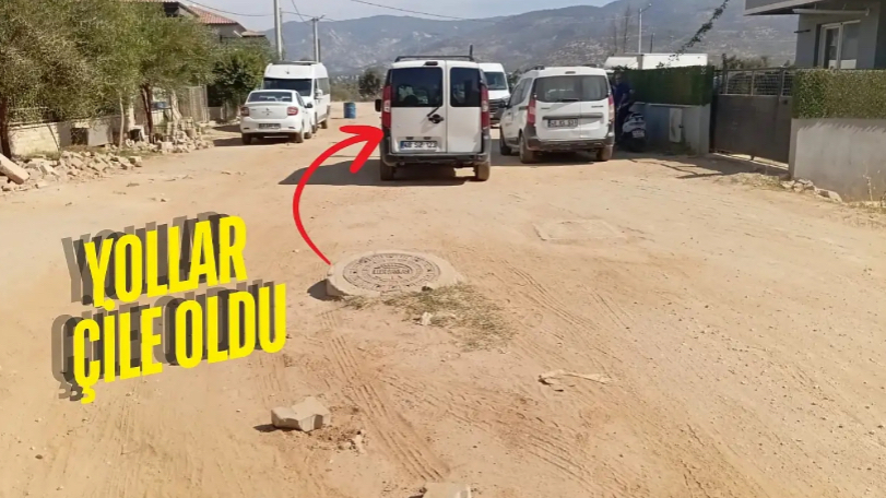 Milas’ta Yol Ortasında Bırakılan Rögar Kapağı Otomobile Zarar Verdi